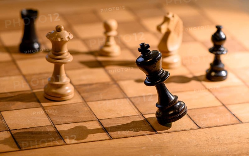 Chessboard with wooden chessmen