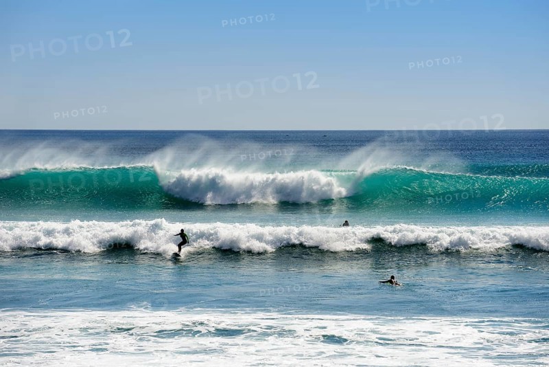 Surfers at Jimbaran Beach