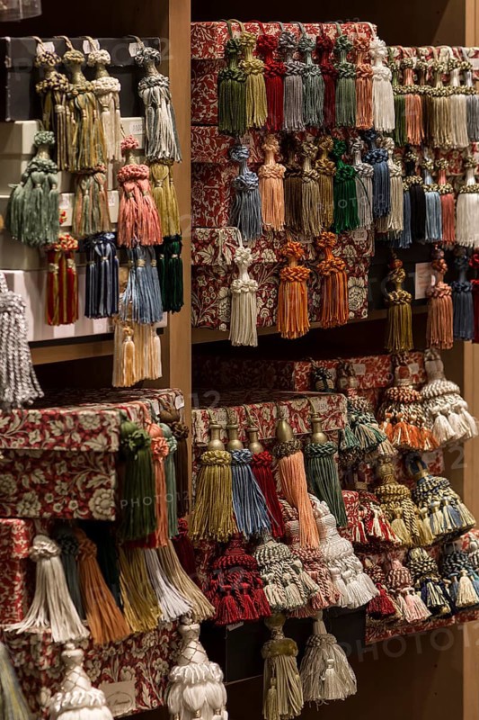 Shelf with colourful tassels