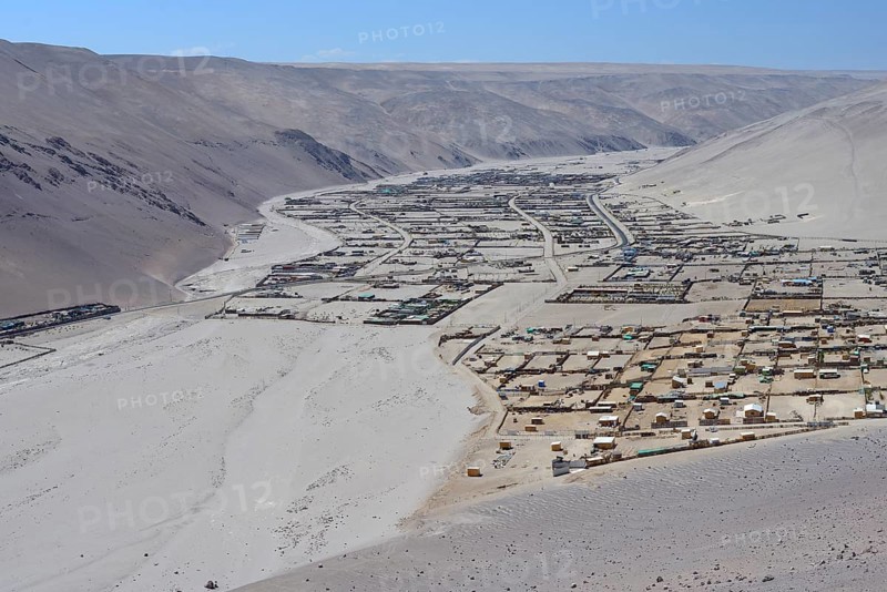 View of settlement in a dry valley
