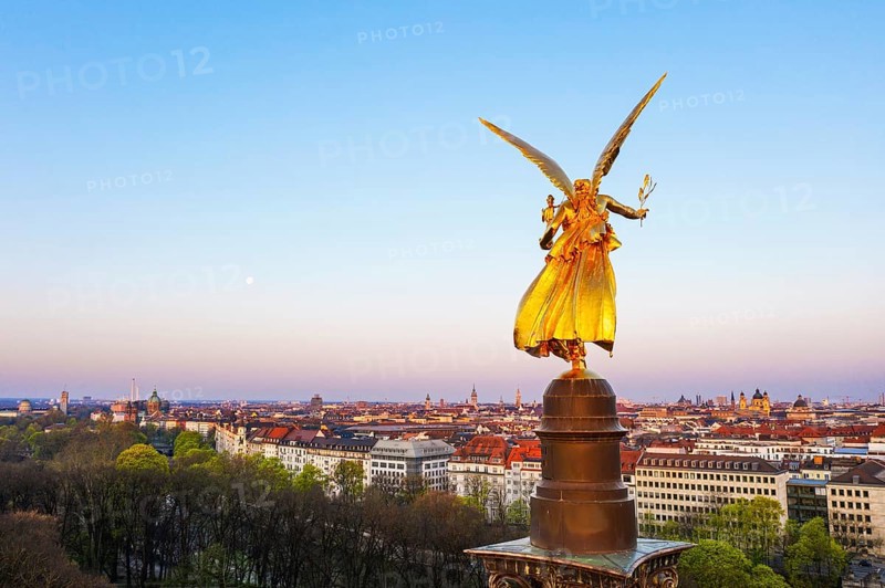 Golden angel of peace in the morning light