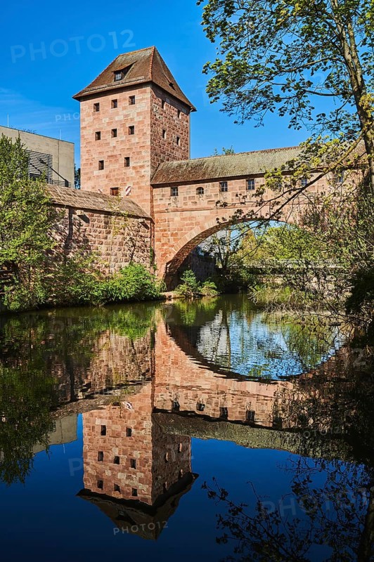 Old city wall with bridge over the Pegnitz