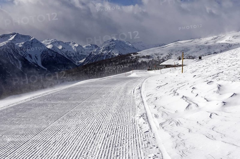 Freshly rolled ski slope at the Ausserschwemmalm mountain restaurant