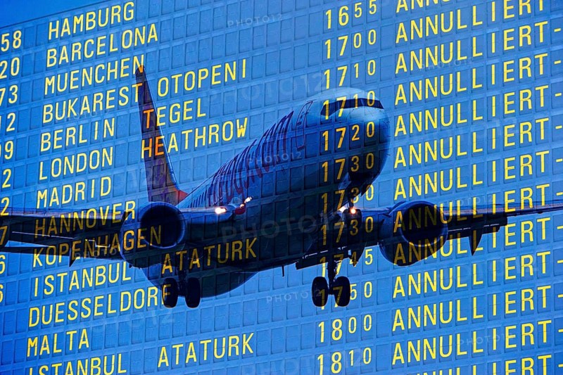 PHOTO MONTAGE, arrival and departure board at the airport