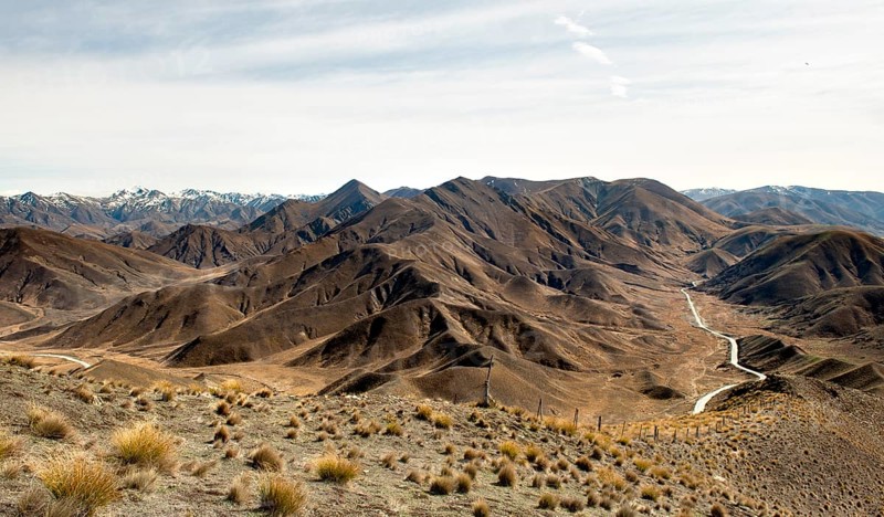 Stark mountain landscape with mountain road, Lindis Pass