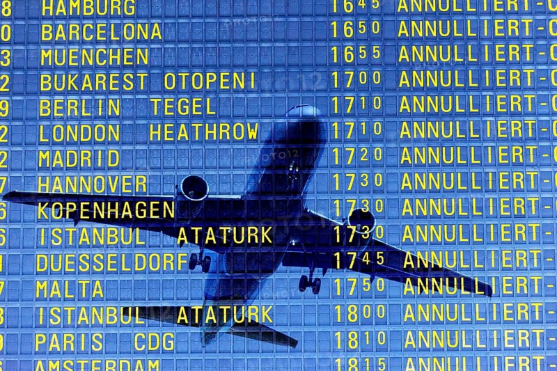 PHOTO MONTAGE, arrival and departure board at the airport