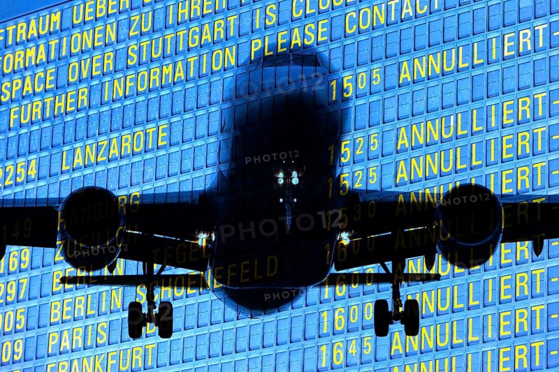PHOTO MONTAGE, arrival and departure board at the airport