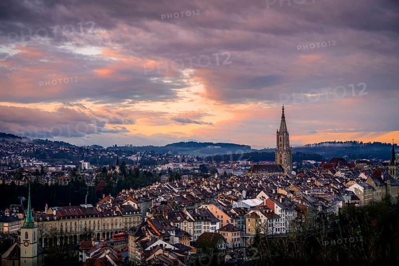 City view at sunrise, view from the rose garden to the old town
