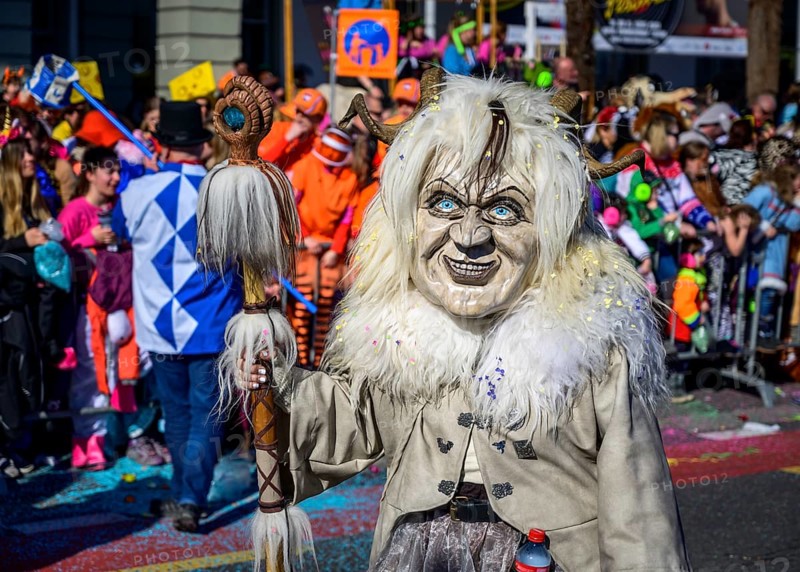 Masked woman with mask, Carnival parade of the Wey Guild on Rosenmontag