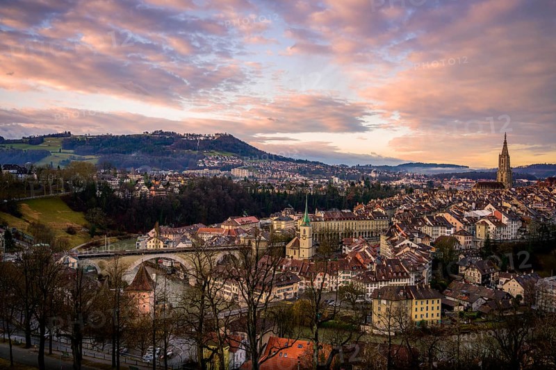 City view at sunrise, view from the rose garden to the old town