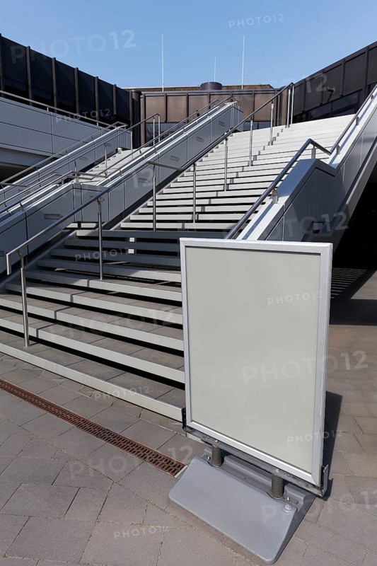 Staircase and poster stands without advertising, closed Duesseldorf exhibition centre