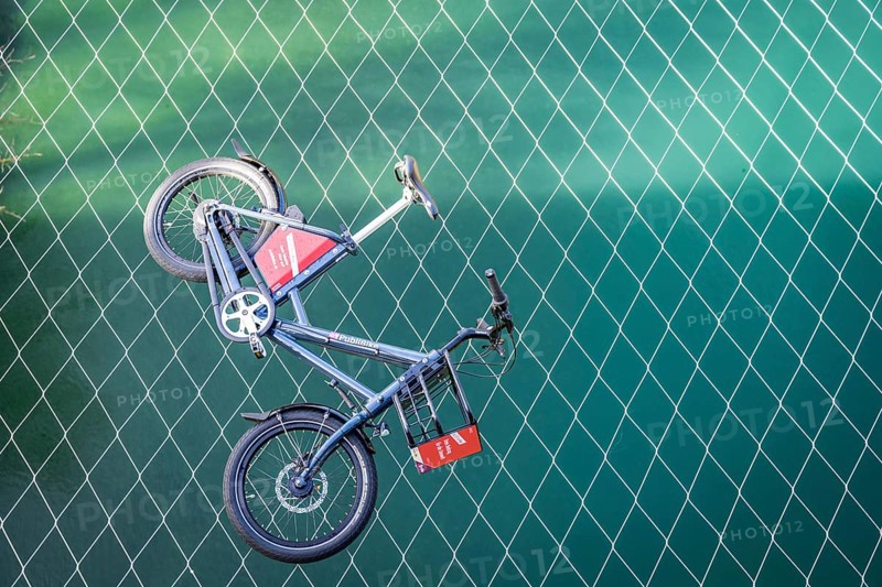 Bike of the bike sharing provider PubliBike is located on the catching net of the Kirchenfeld bridge over the Aare, bike rental