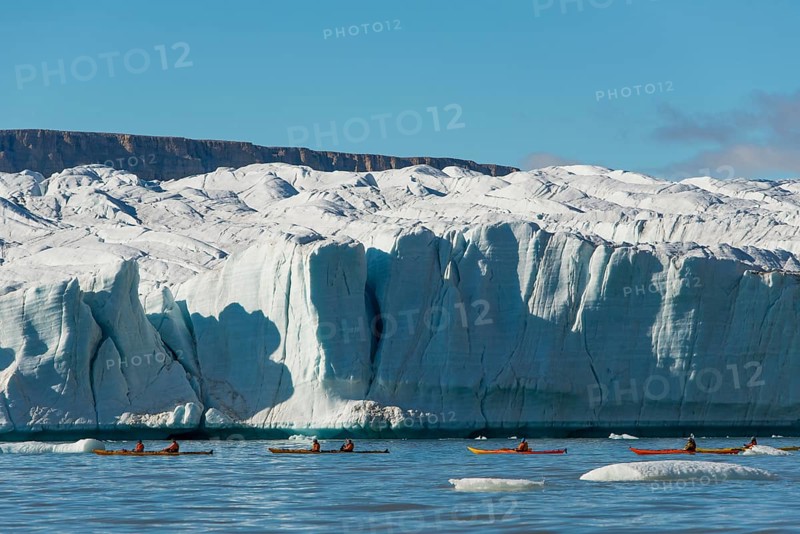 Tourists in kayaks in front of glaciers, Croker Bay