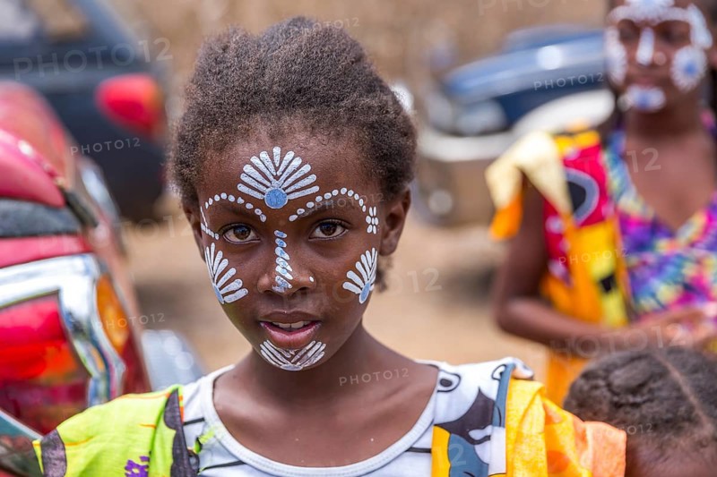 Native young girl with traditional face painting, Diego Suarez