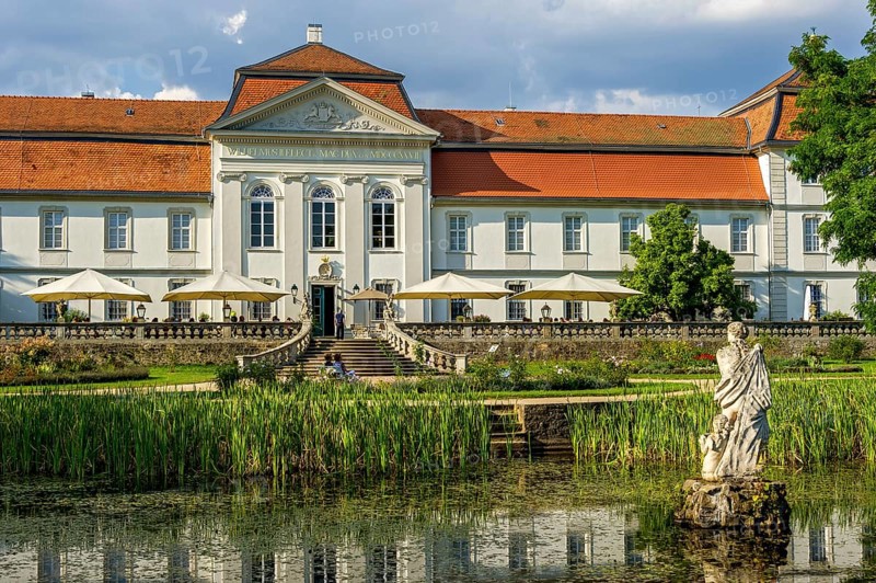 South facade at the palace garden with Venus statue in pond, baroque palace Fasanerie