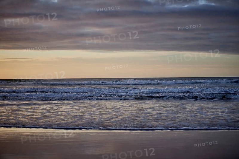 Running waves on the sandy beach