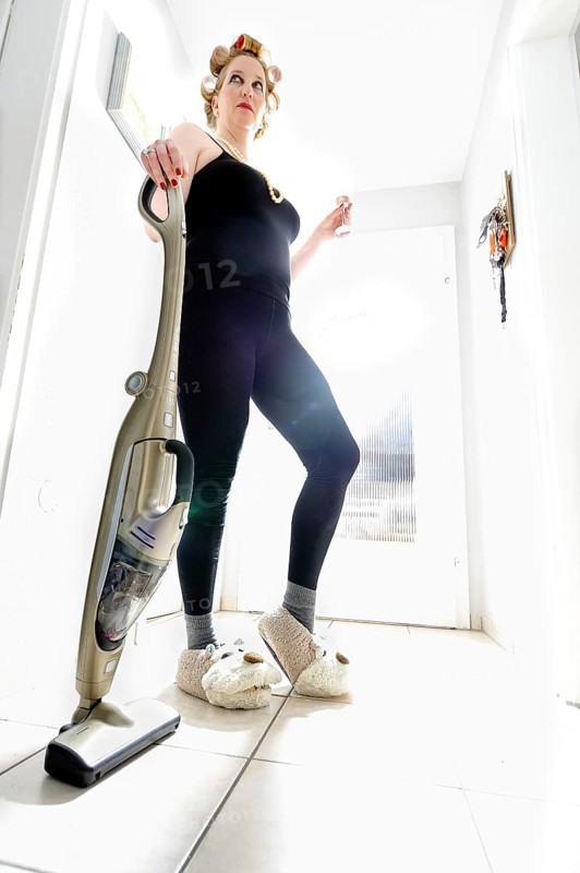Woman vacuum cleaning
