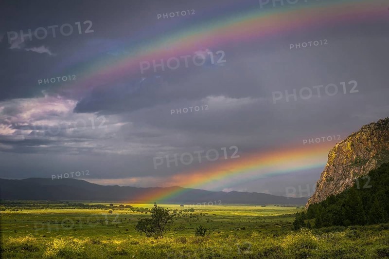 Double rainbow on the steppe after raining