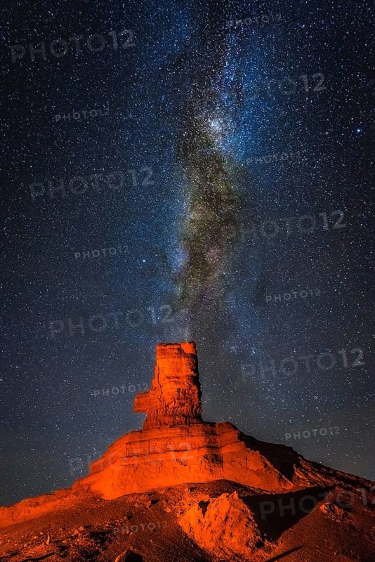 Rock formation at night with starry sky and Milky Way