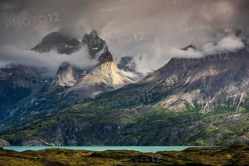 View over Lake Nordenskjoeld to the mountain range Cuernos del Paine in clouds