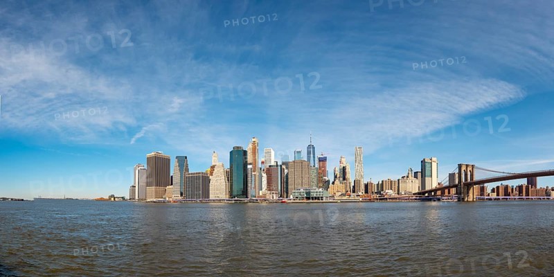 View from Pier 1 over the East River to the skyline of Lower Manhattan with Brooklyn Bridge