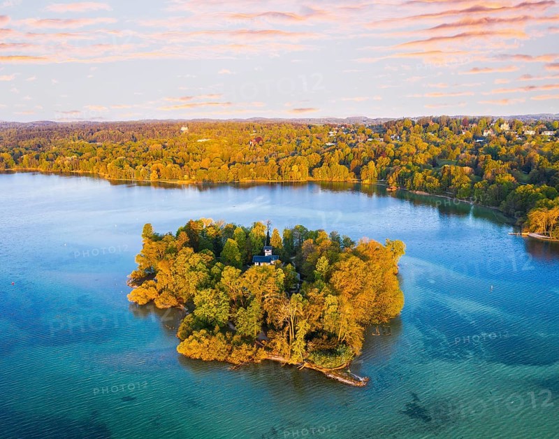 Rose island with castle in the Starnberger See near Feldafing in the morning light