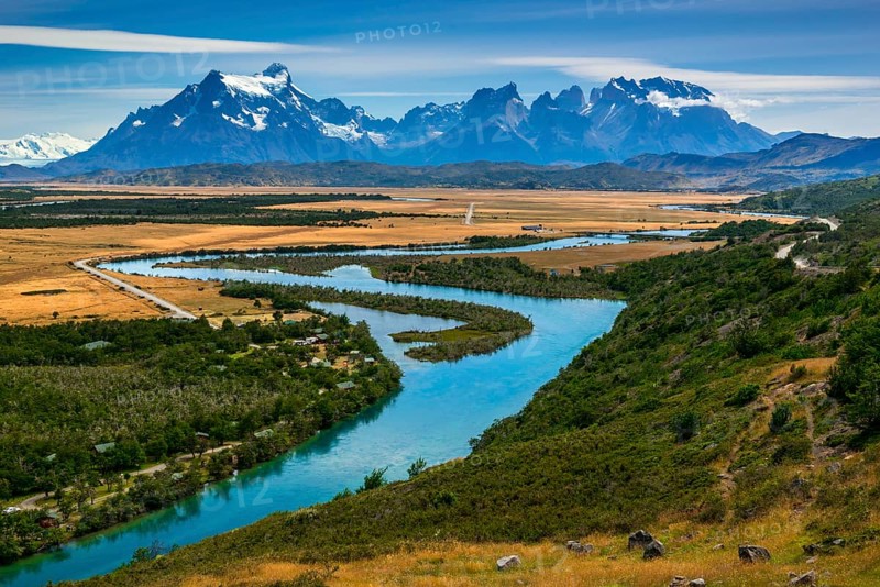 View of the mountain range Cuernos del Paine over the river Rio Serrano