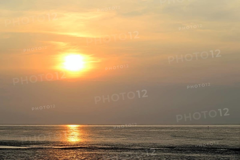 Sunset at the Wadden Sea at low tide