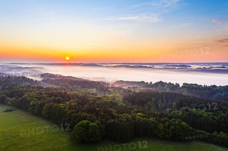 Sunrise and early morning fog over Isar valley near Icking