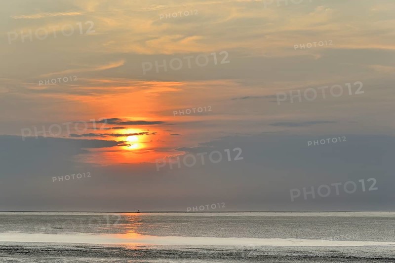 Sunset at the Wadden Sea at low tide