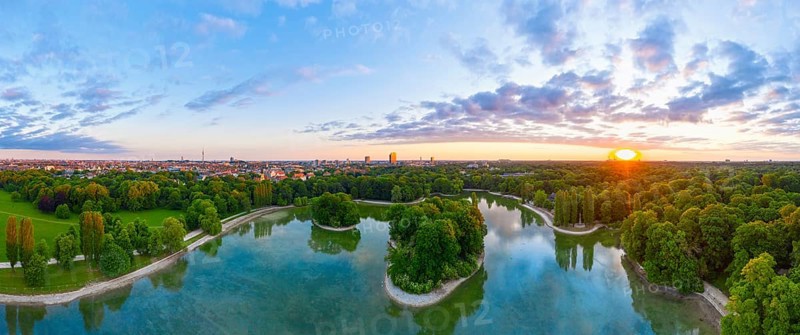 Panorama of Kleinhesseloher See at sunrise