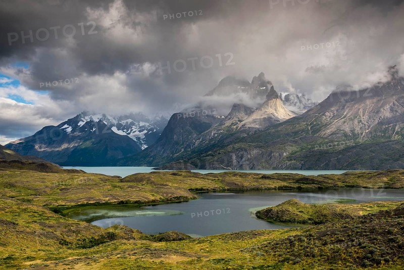 View over Lake Nordenskjoeld to the mountain range Cuernos del Paine in clouds