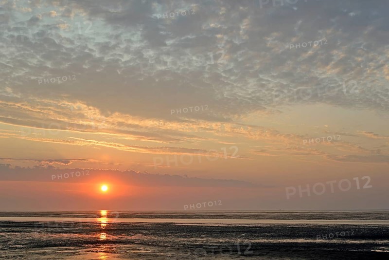 Sunset at the Wadden Sea at low tide