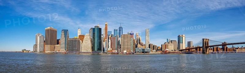 View from Pier 1 over the East River to the skyline of Lower Manhattan with Brooklyn Bridge