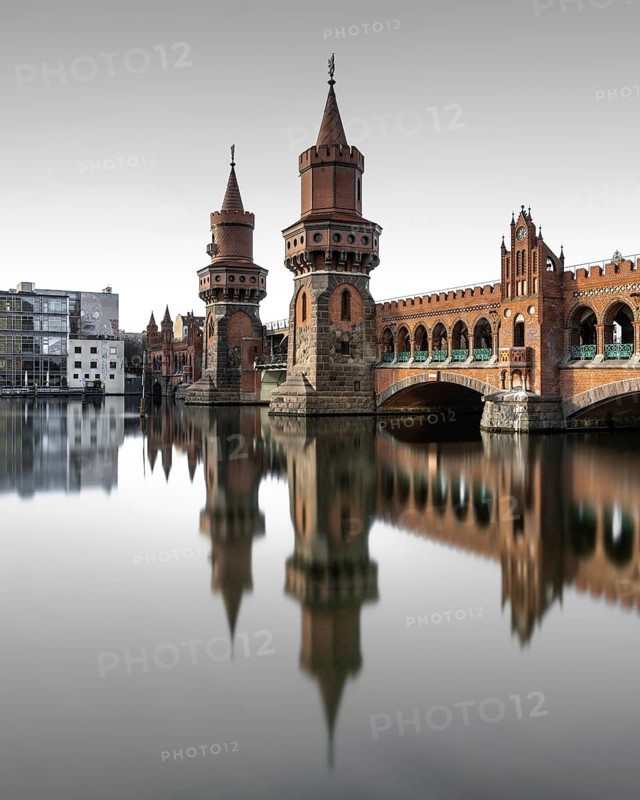 Berlin Oberbaum Bridge at Warschauer Strasse in Berlin with reflection in the Spree