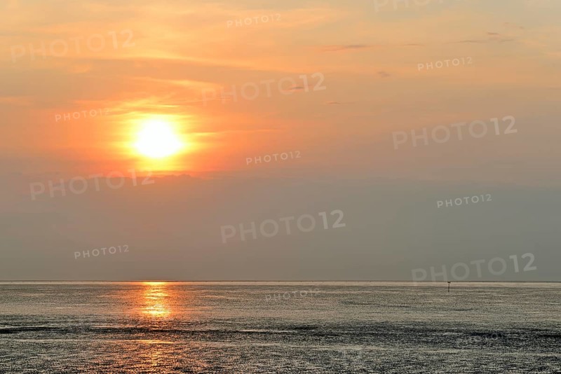 Sunset at the Wadden Sea at low tide