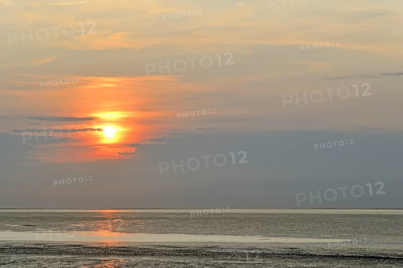 Sunset at the Wadden Sea at low tide