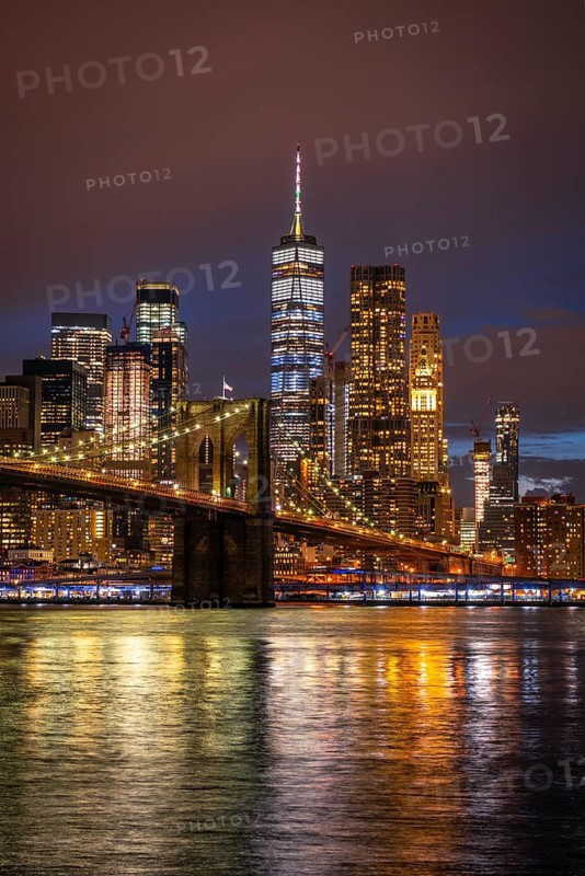 View from Main Street Park at night over the East River to the skyline of lower Manhattan