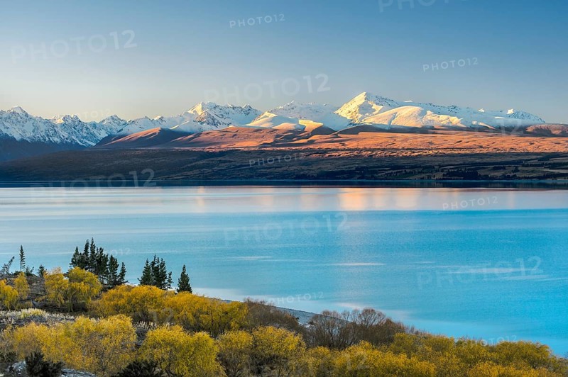 Lake Pukaki in front of snowy mountain range