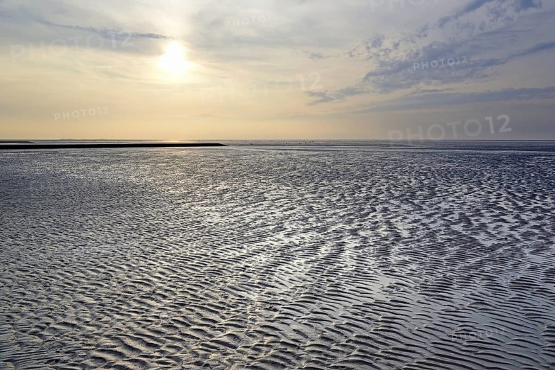 Sunset at the Wadden Sea at low tide