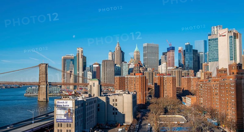 View from Manhattan Bridge to the skyline of Lower Manhattan and Brooklyn Bridge