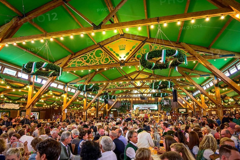 Guests sit comfortably in the festival tent