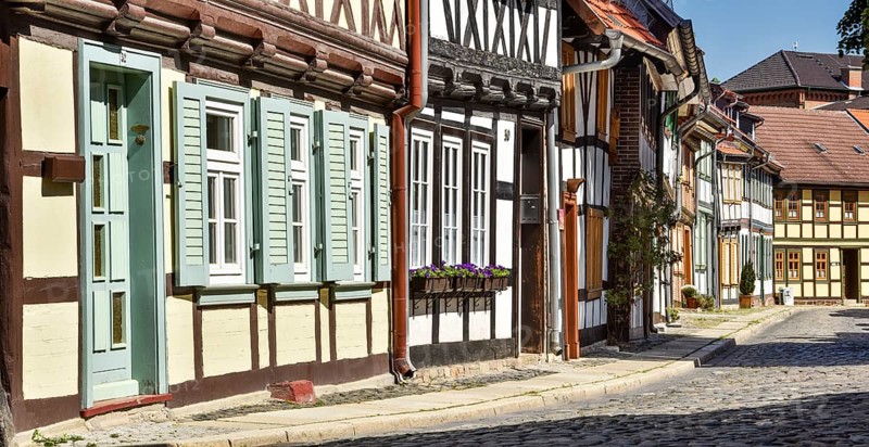 Alley with half-timbered houses and cobblestones