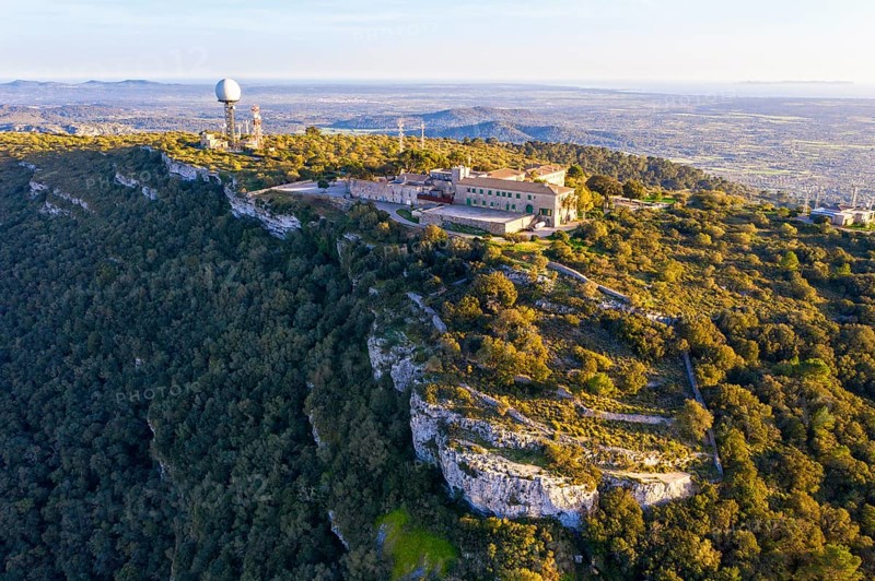 Monastery Santuari de Nostra Senyora de Cura and antenna installations on the mountain Puig de Randa