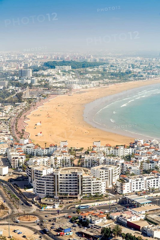 Modern architecture and sandy beach in Agadir