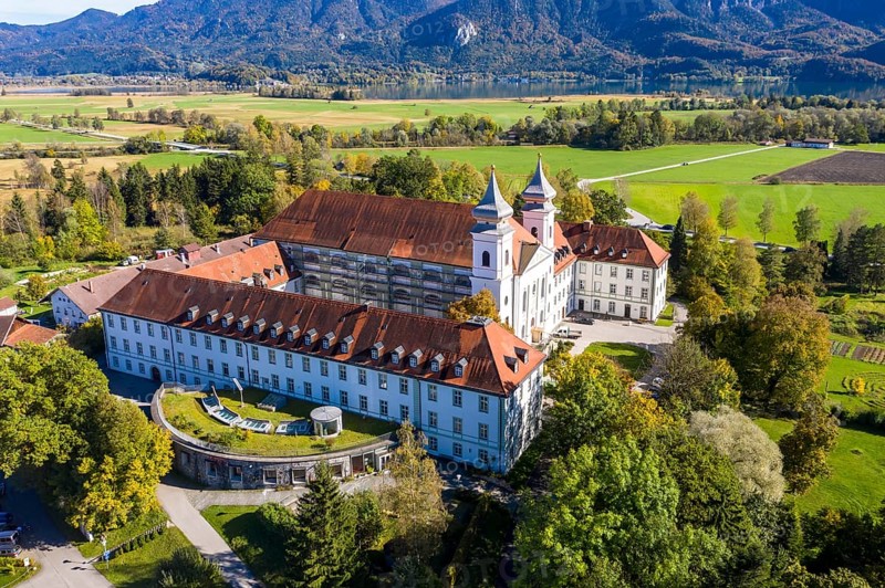 Aerial view of Schlehdorf Monastery with St. Tertulin Parish Church at Lake Lake Kochel