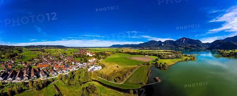 Aerial view of Schlehdorf Monastery with St. Tertulin Parish Church at Lake Lake Kochel