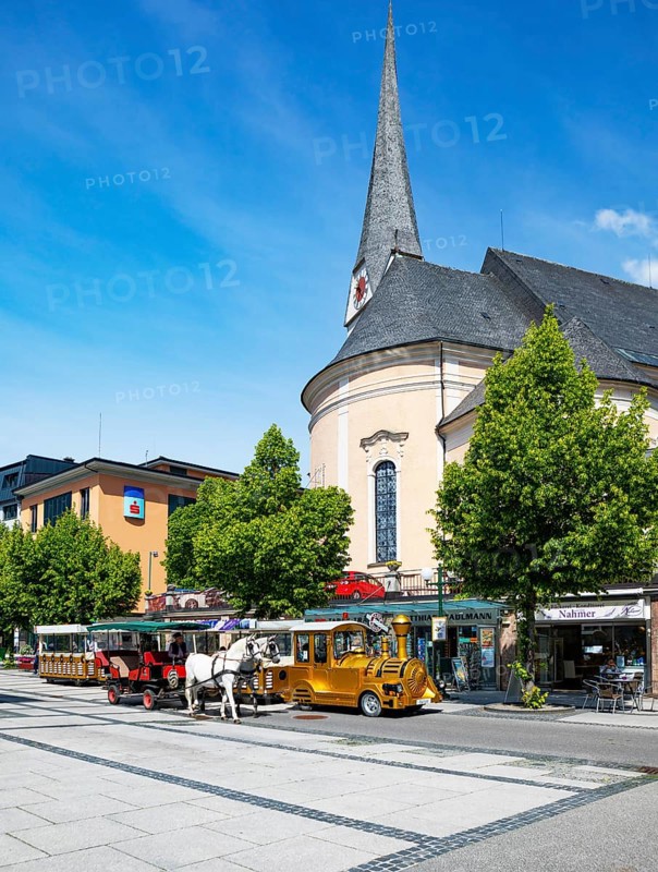 Fiaker and slow train in the pedestrian zone