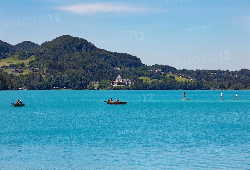 Boats at the Fuschlsee with castle Fuschl