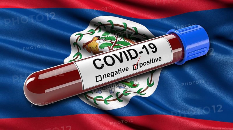 Flag of Belize waving in the wind with a positive Covid-19 blood tube
